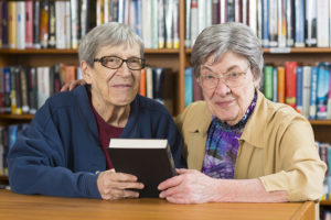 Otterbein residents sitting in the library