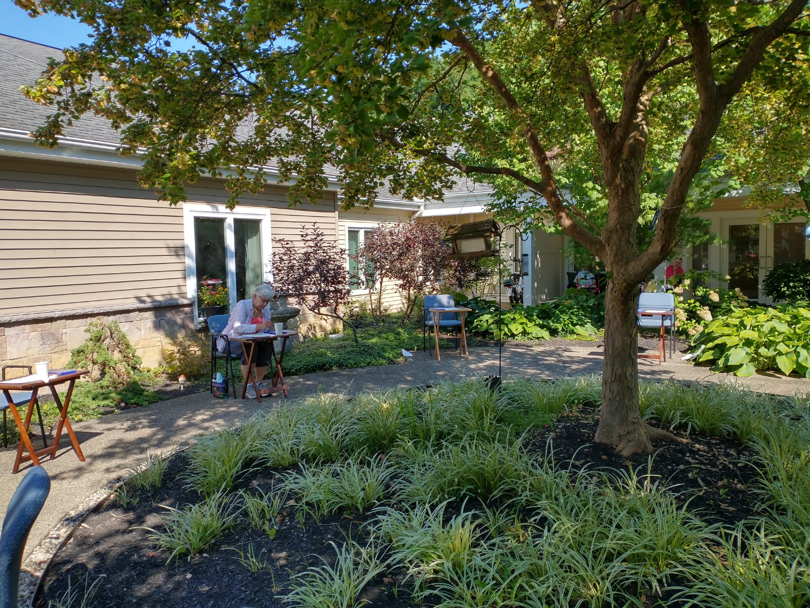 Otterbein Granville resident plein air painting in The Courtyard.