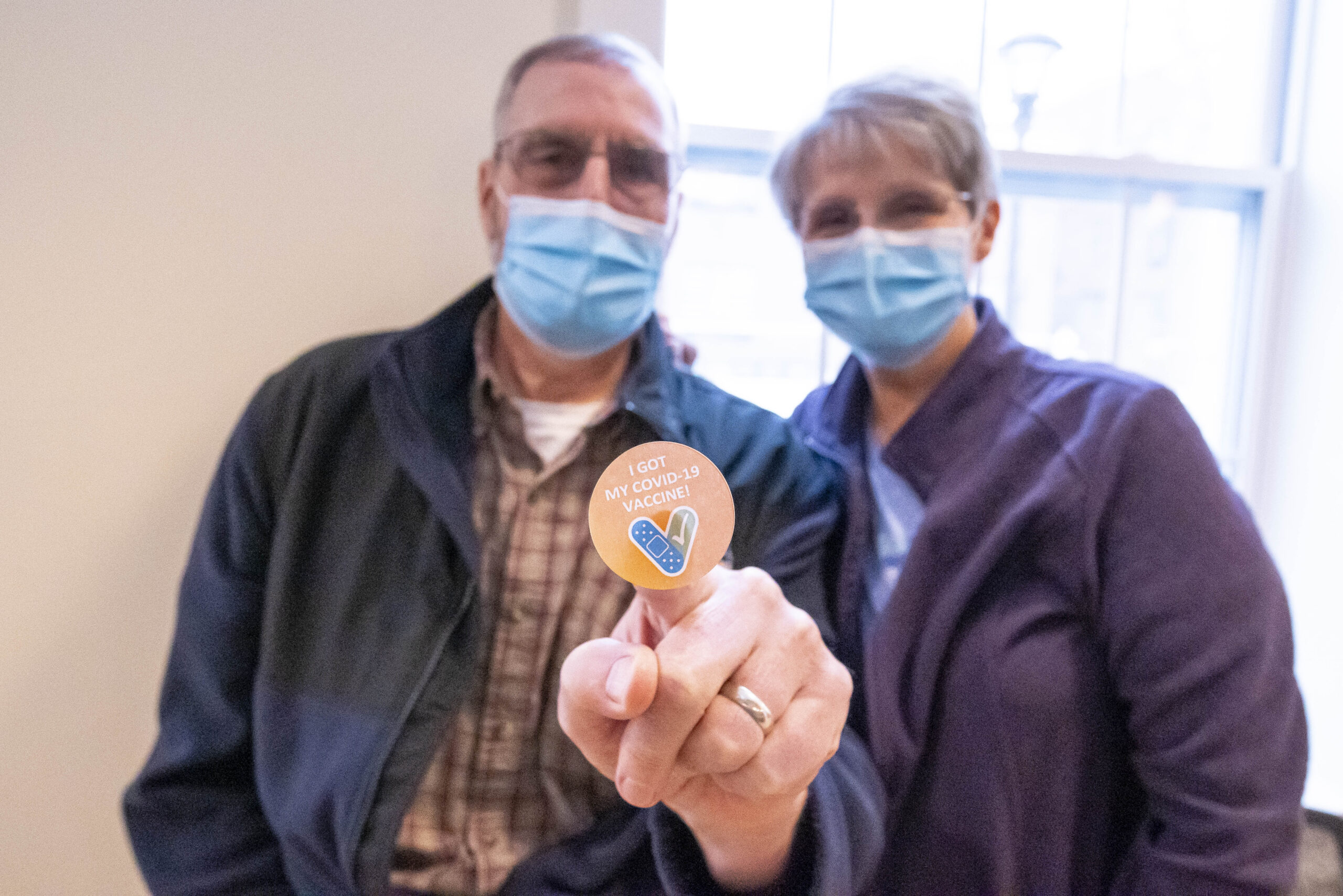 Otterbein residents with a vaccinated sticker