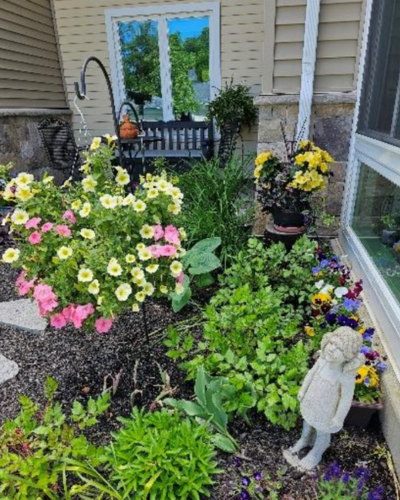 Beautiful flowers outside a three-season room. 