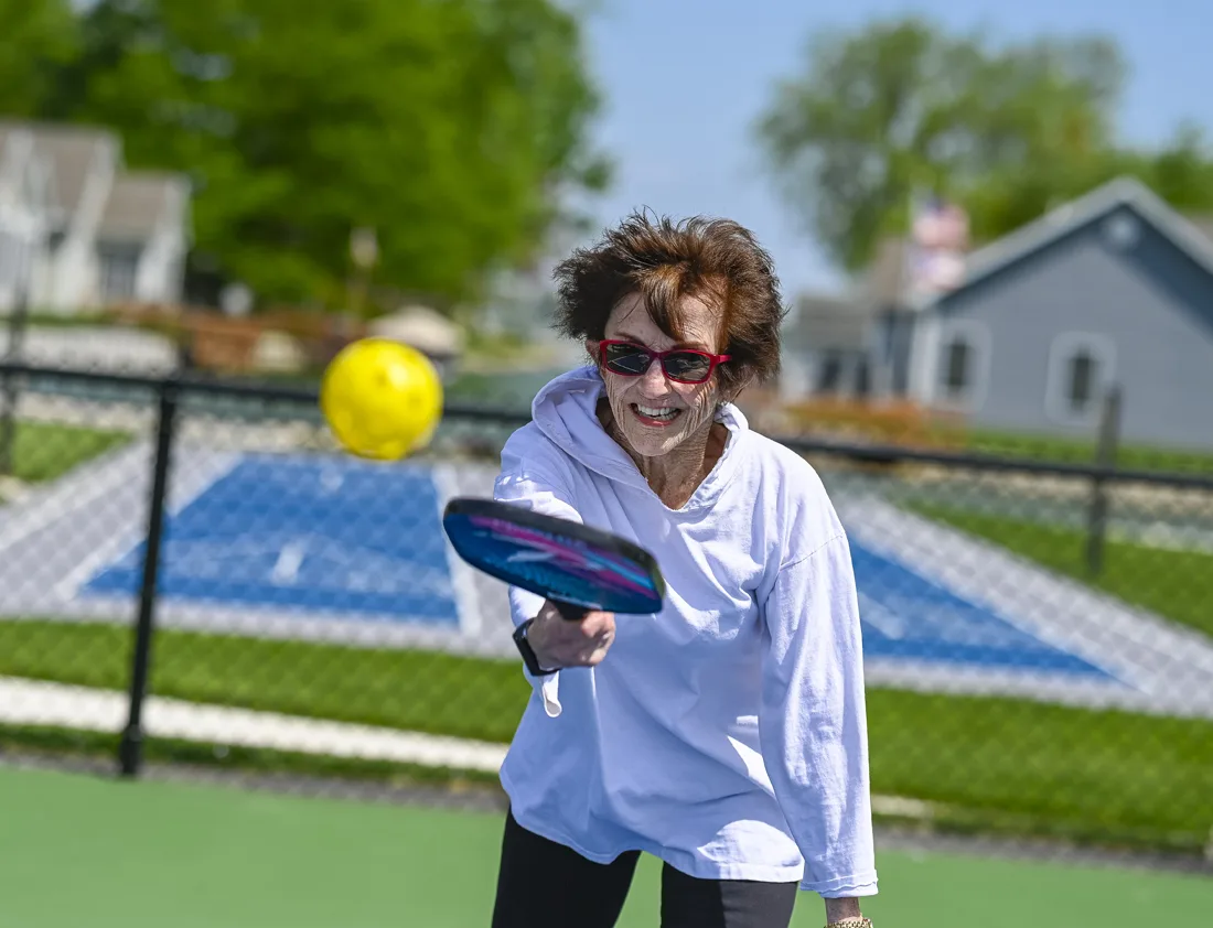 Otterbein St. Marys resident playing pickleball outside
