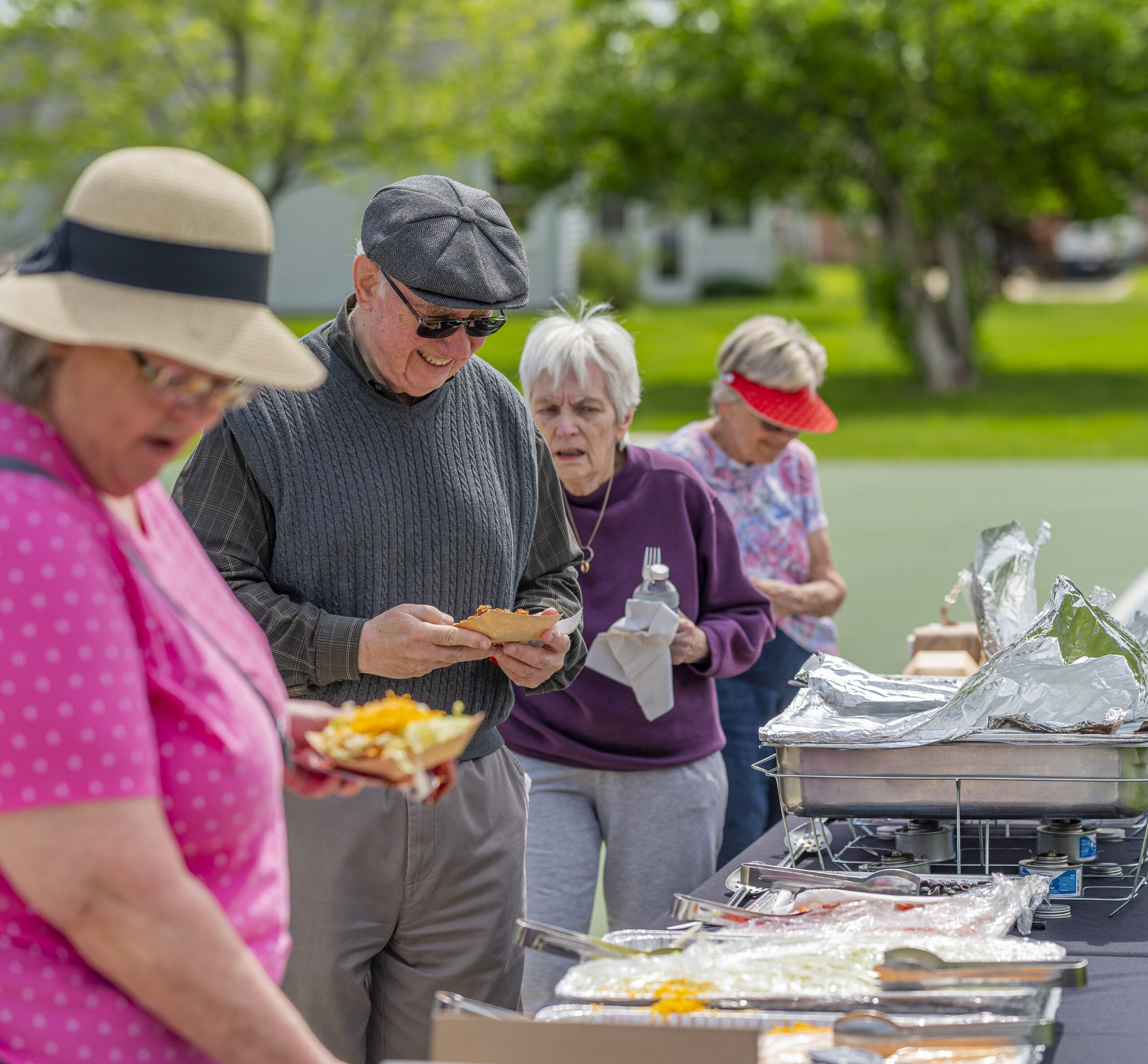 Otterbein Franklin residents choose from a buffet outdoors