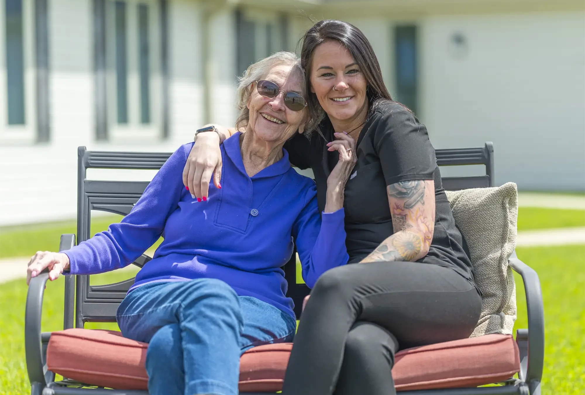 Otterbein resident and partner sitting and smiling together