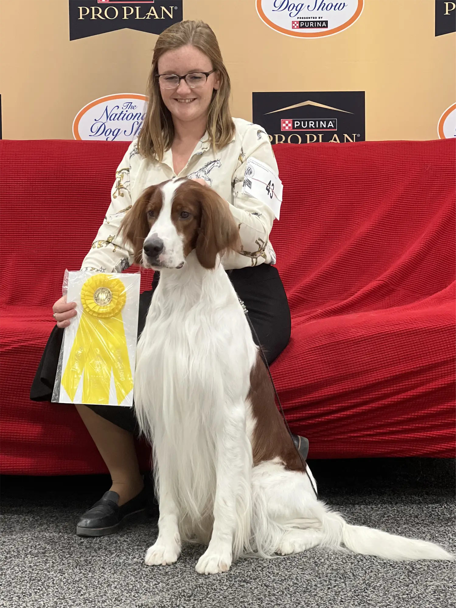 Cole sitting with his ribbon