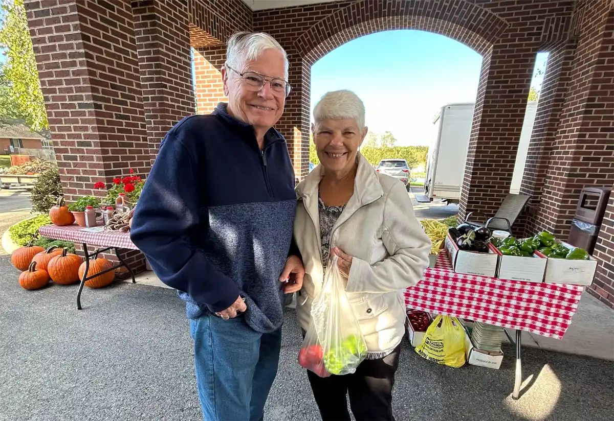 Couple at a Farmers Market at Otterbein Cortland