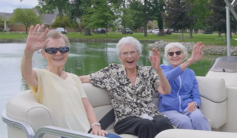 St. Marys residents smiling and waving