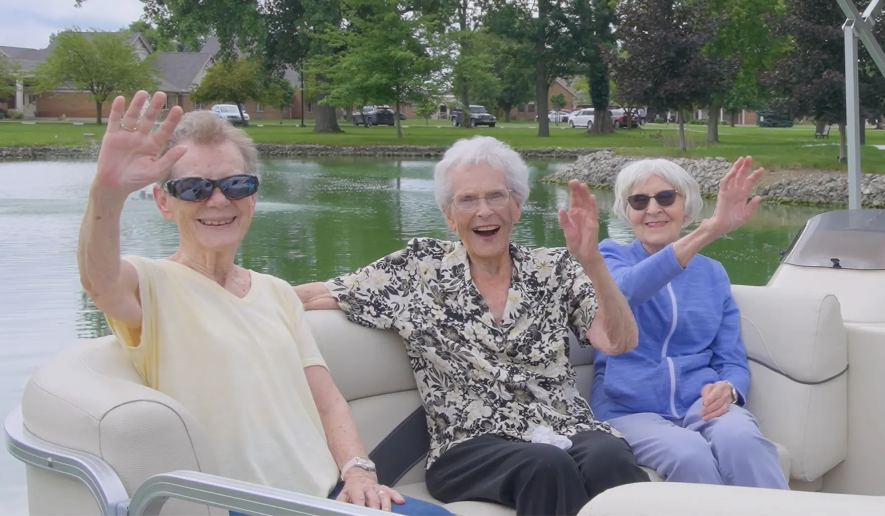 St. Marys residents smiling and waving