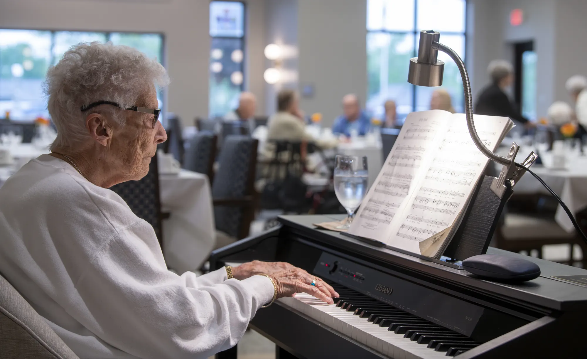 Otterbein Jackson resident playing the piano